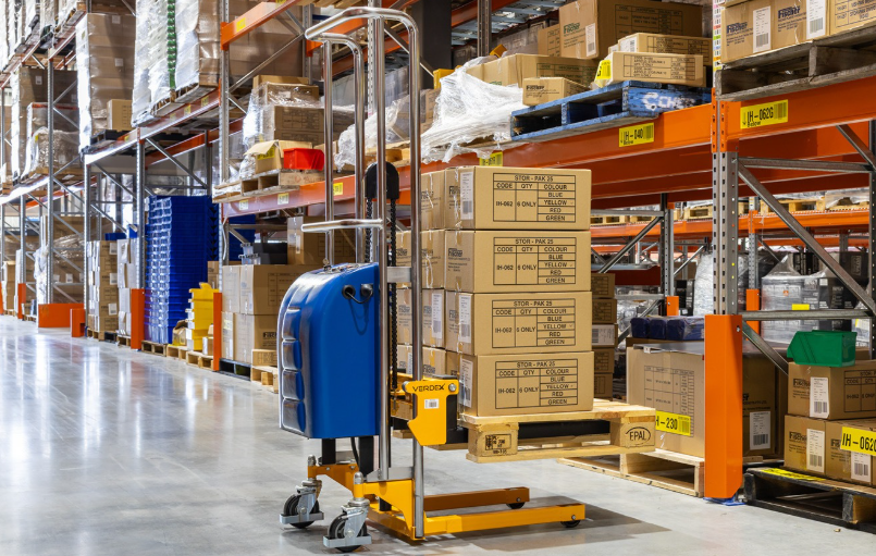 Electric Fork Platform Stacker used for material handling in a warehouse.