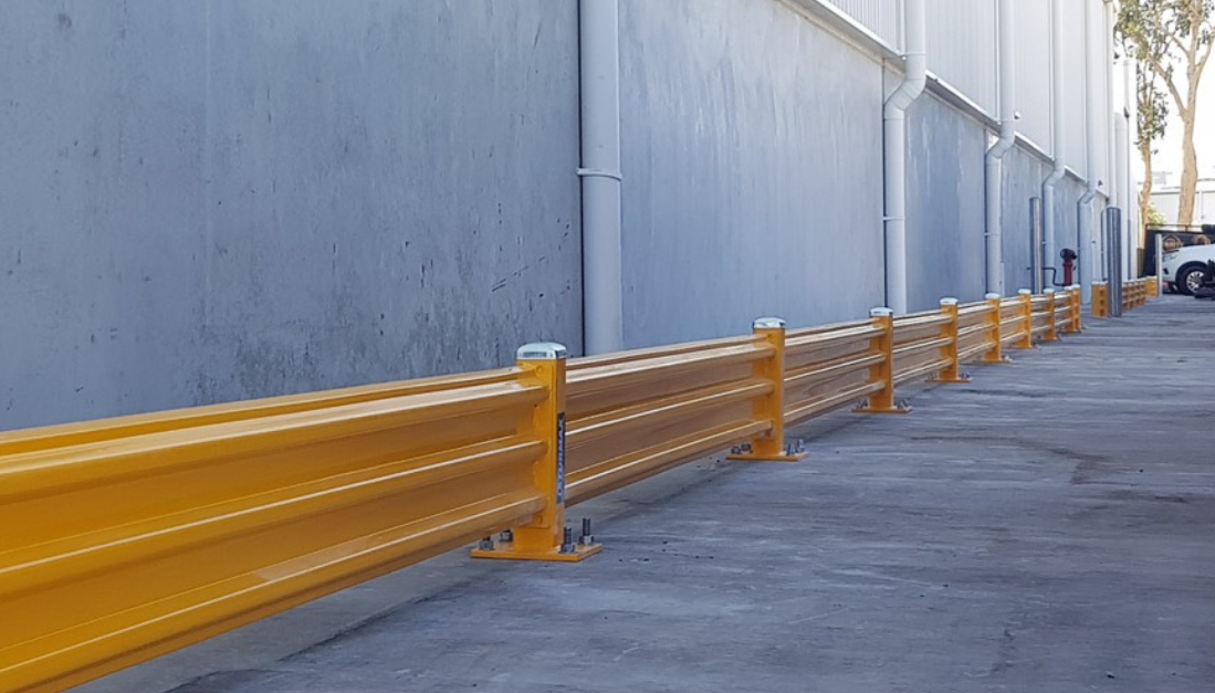 extended yellow safety guard rail fencing outdoor warehouse