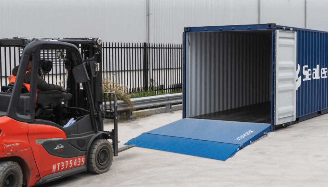 Forklift Driver Approaching 7 Tonne Capacity Container Ramp Connected To Shipping Container