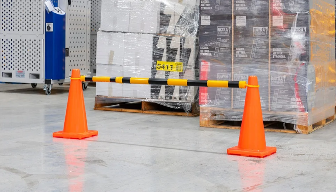 orange safety traffic cones with traffic cone extension bar