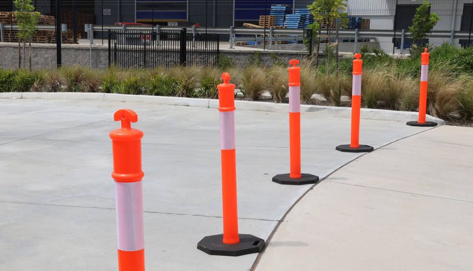 t top plastic bollards set up warehouse outdoor