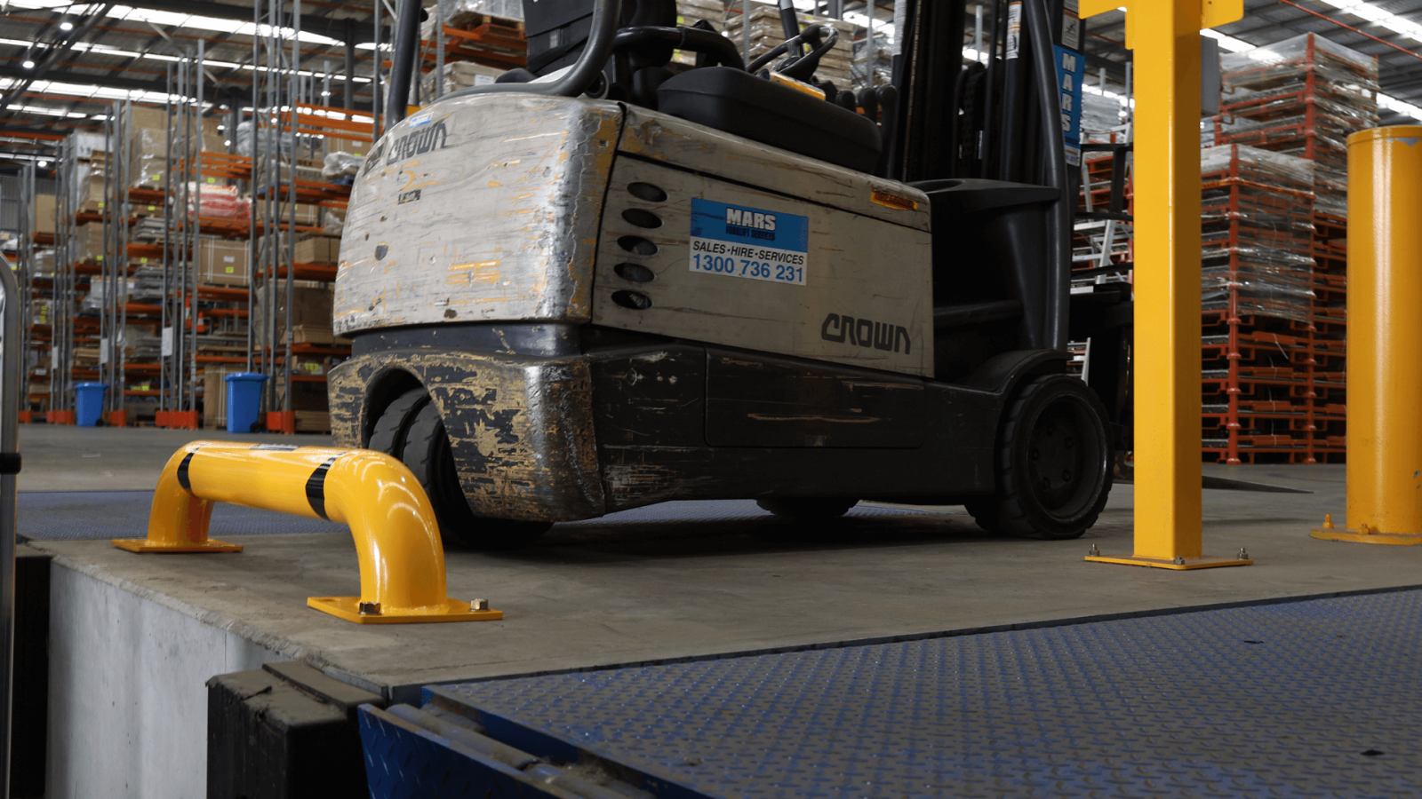 u bar low bollard forklift in warehouse