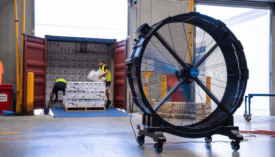 verdex industrial mobile fan operating in warehouse environment