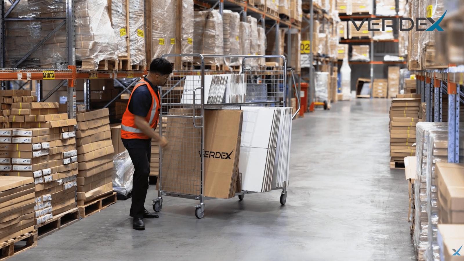Warehouse Retail Specialist Moving Packaging Supplies With Packaging Carton Trolley