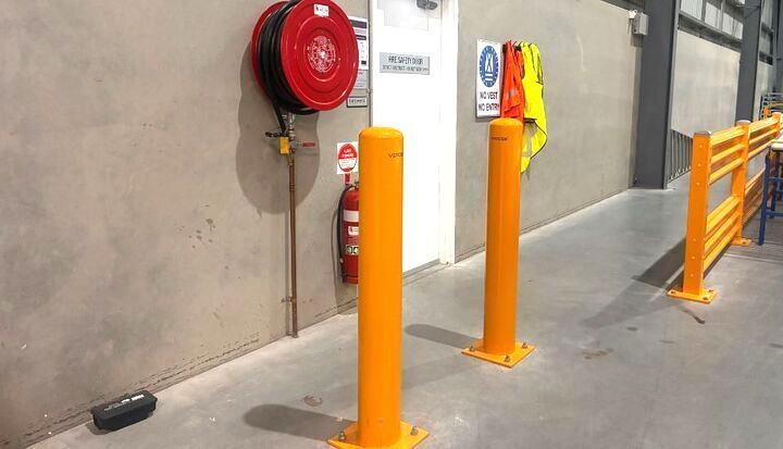 yellow bollards warehouse safety barriers