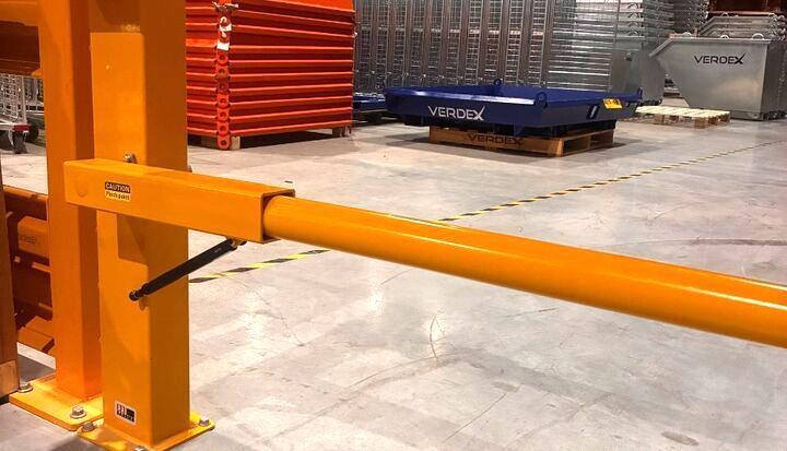 yellow safety barrier arm warehouse